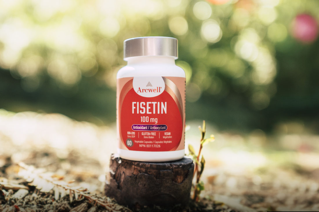 Arcwell Fisetin 100 mg supplement bottle outdoors, antioxidant and anti-aging support.